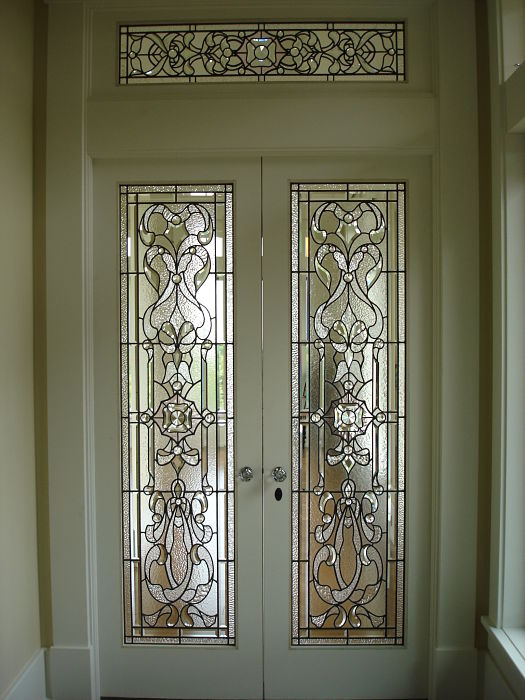 Leaded and bevelled glass doors and transom