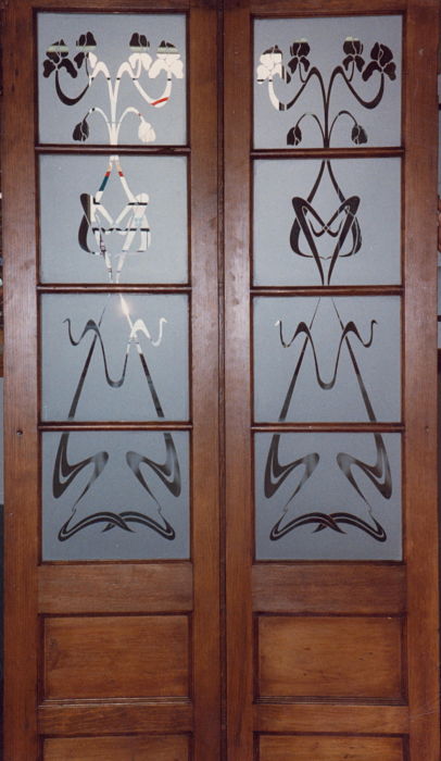 Etched glass in two antique doors