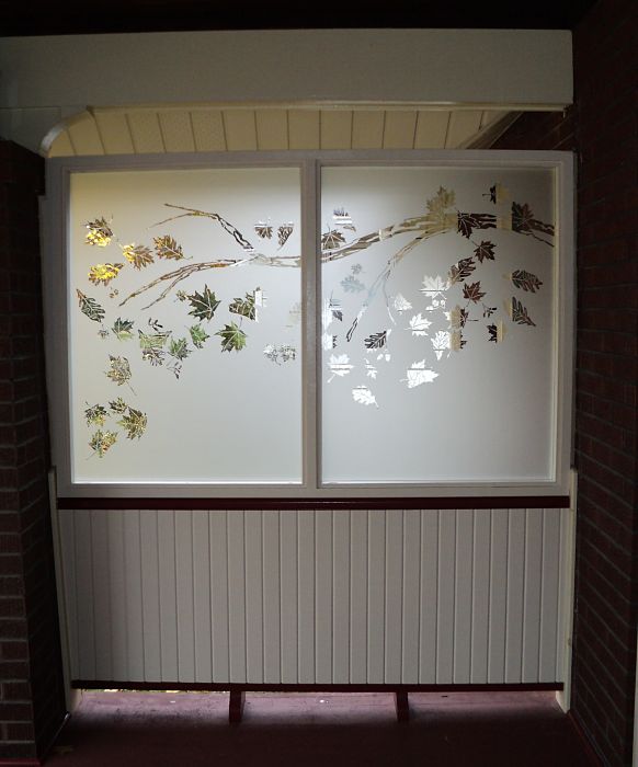 Etched glass panels with branches and leaves