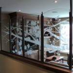 TheGlassStudio Image 69-Private residence, Toronto © Carved glass divider screen featuring branches and leaves